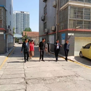 沂南县司法局到卧龙山社区开展共驻共建“双报到”活动